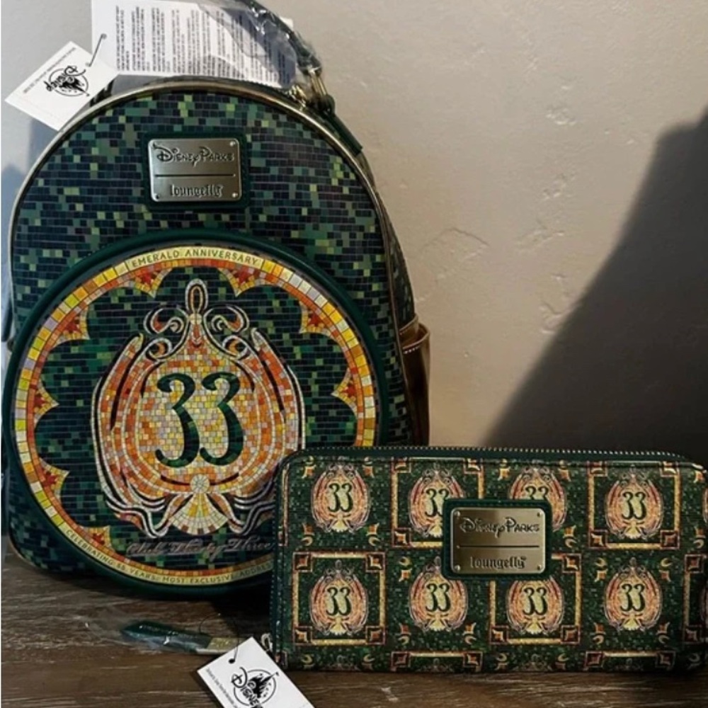 Exclusive, limited edition Disney Club 33 Loungefly backpack and wallet.